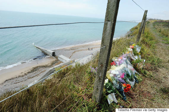 BRIGHTON, ENGLAND - JULY 16: Floral tributes are left at the cliff top location where the 15-year-old son of musician Nick Cave, Arthur, fell from a cliff on Tuesday and suffered serious injuries on July 16, 2015. The teenager who lived in Brighton was found on Undercliff Walk and taken to Royal Sussex County Hospital where he died later that evening. His death is not being treated as suspicious. (Photo by Tabatha Fireman/Getty Images)