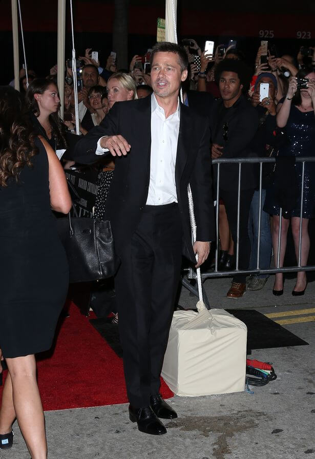 brad-pitt-arrives-at-his-first-public-appearance-for-his-film-premiere-allied