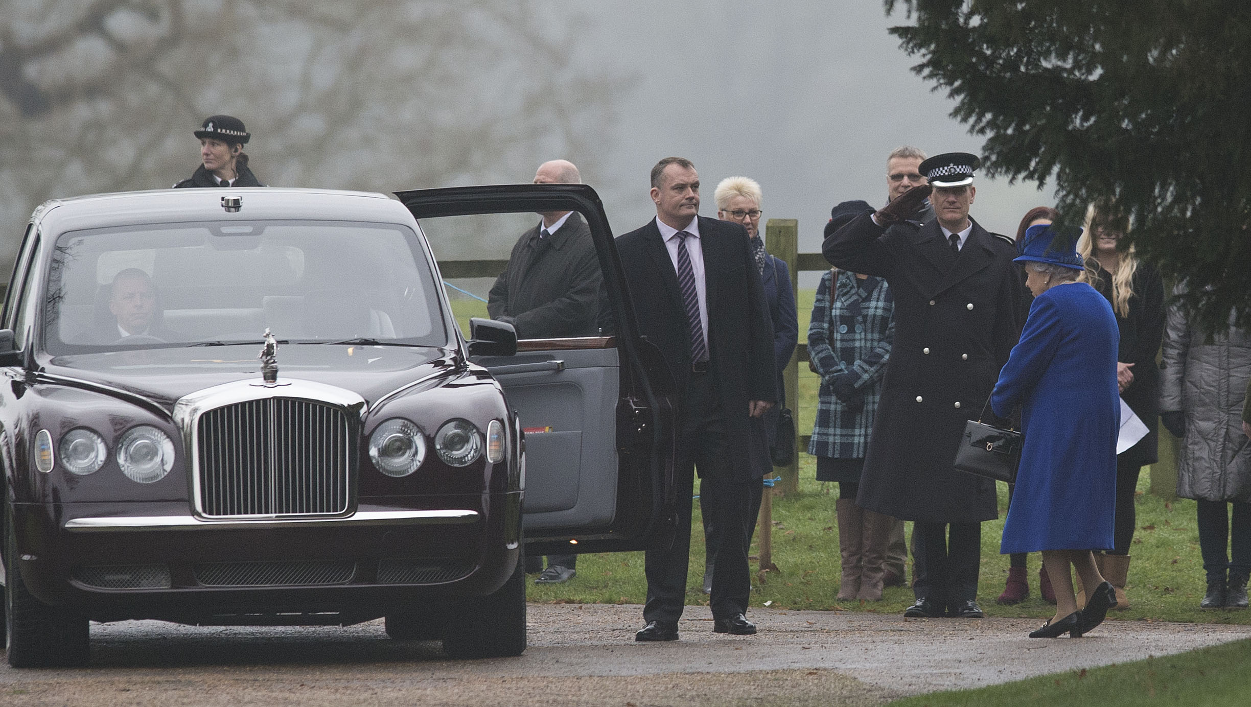 Britain's Queen Elizabeth leaves after a service at St. Mary Magdalene church in Sandringham