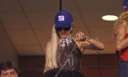 Lady-Gaga-Pours-Champagne-Over-the-Railing-at-the-NY-Giants-Game-5-400x300 copy