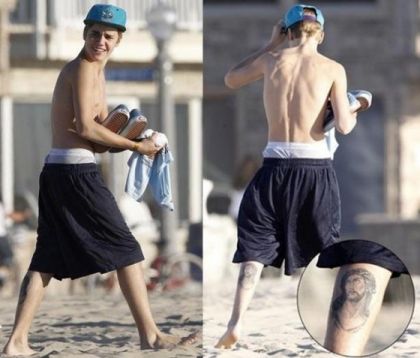 Justin-Bieber-Jesus-tattoo-left-leg-560x477